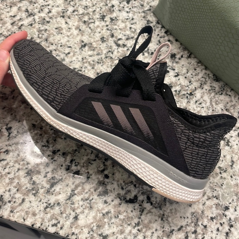 Womens black and grey adidas shoes size 8. Barley worn.